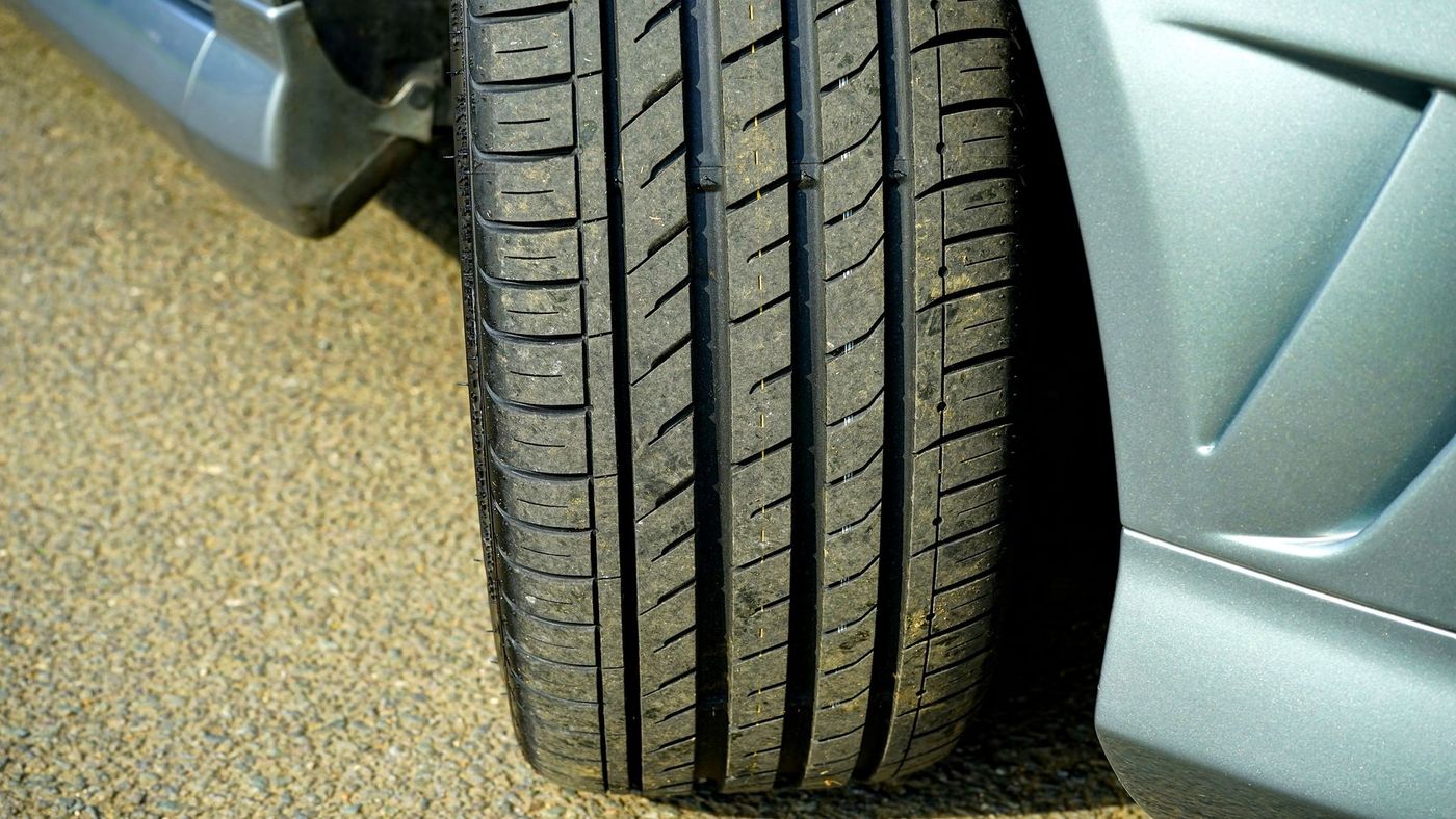 A clean tyre and alloy wheel on a car. Stock photograph.
